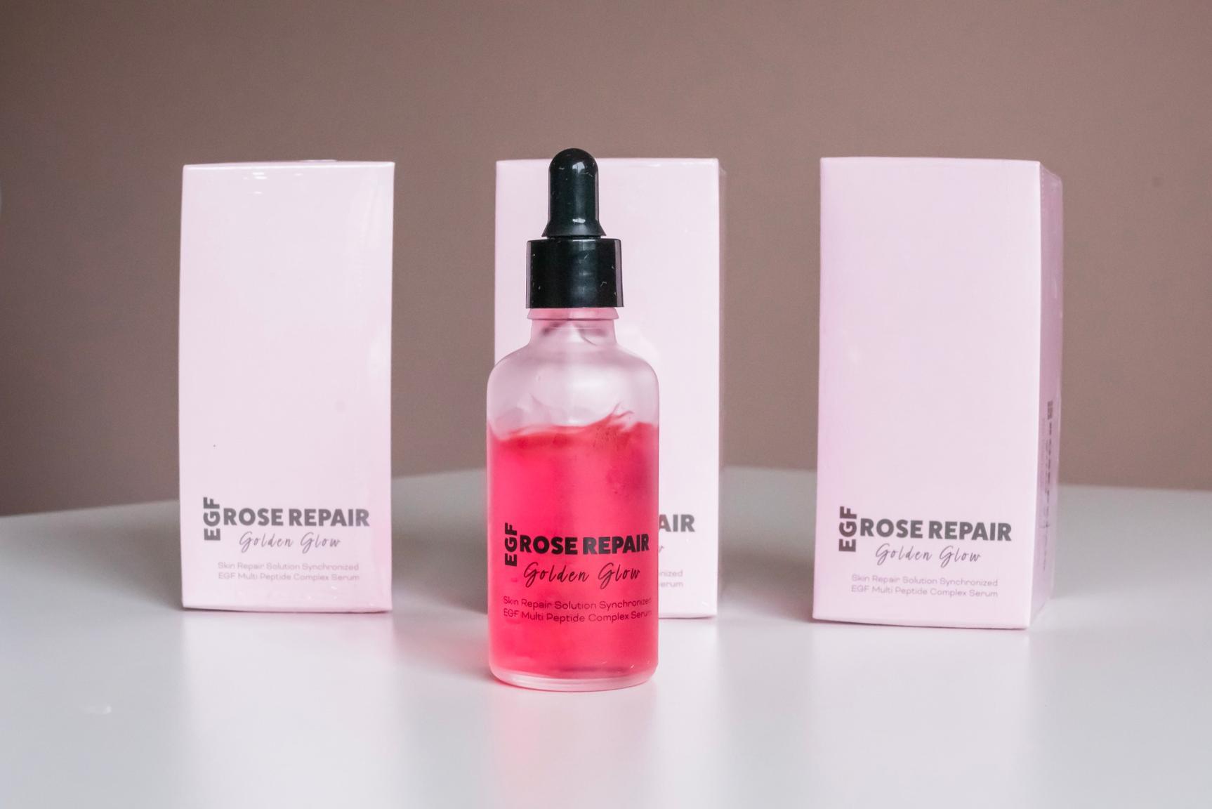 bottle of rose repair on a white surface with packaging